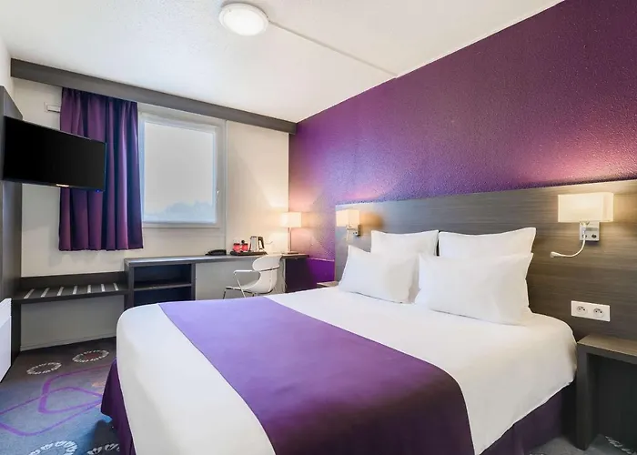 Kyriad Gare - Grand Palais Hotel 3*